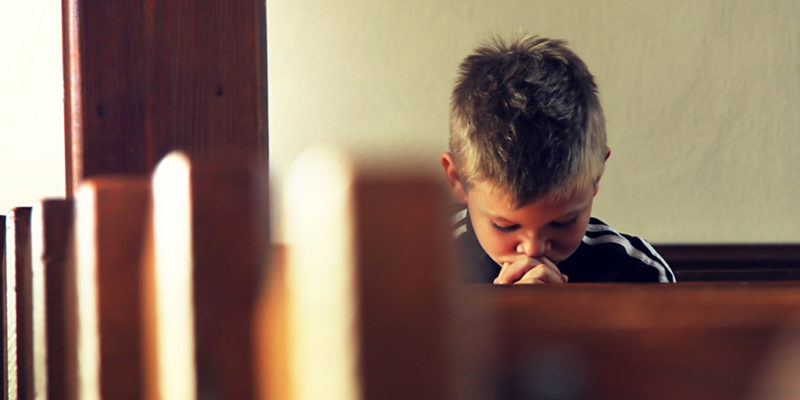Boy is praying